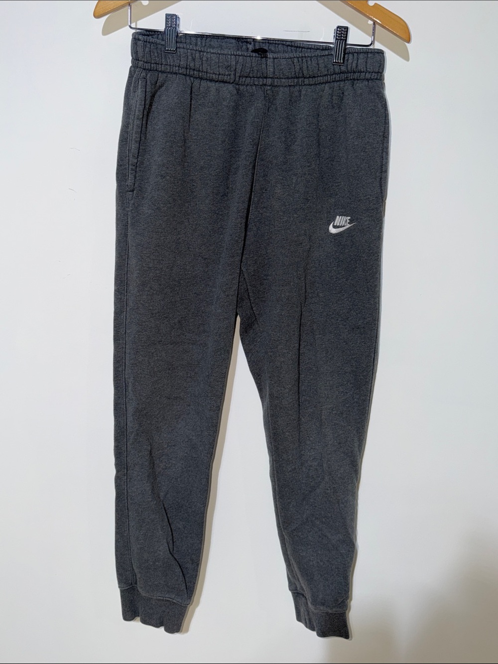 Nike men’s   Charcoal Gray Fleece Joggers with White Swoosh size small